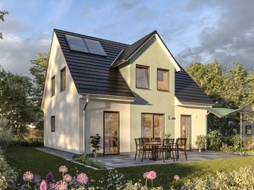 Einfamilienhaus mit Solarmodulen, Terrasse und Garten als Beispiel für energieeffizienten Hausbau in Beetzsee