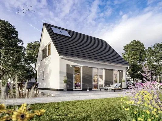 Modernes Einfamilienhaus mit Satteldach, Solarmodulen und Garten als Beispiel für Hausbau in Mühlenfließ
